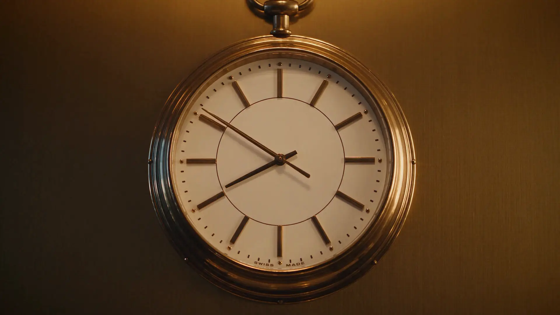 A pocket watch, from the PHAL OS launch film: the hours PHAL OS gives back to hotel teams